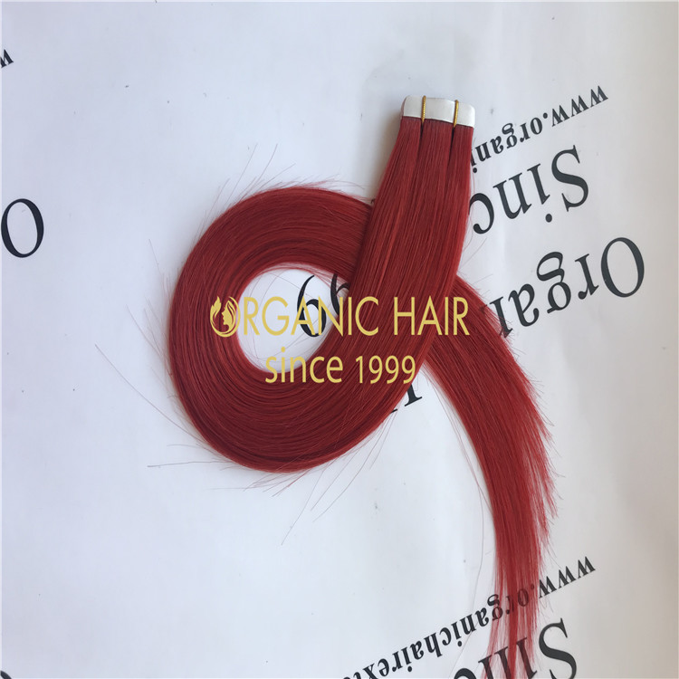 Red color hair tape in hair extensions H88